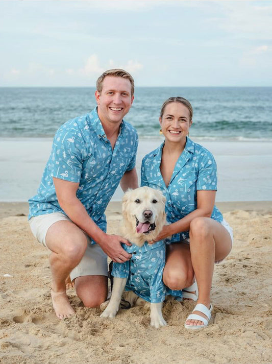 Dog wearing the Tiki Time BBQ shirt in a chambray inspired tiki print