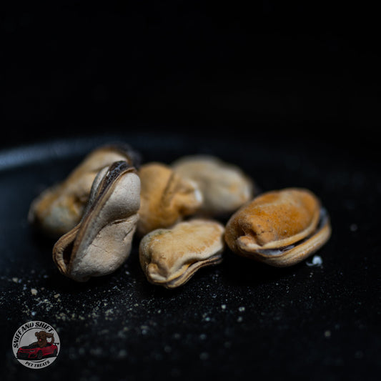 A pour shot of Captain's Catch freeze-dried seafood medley treats