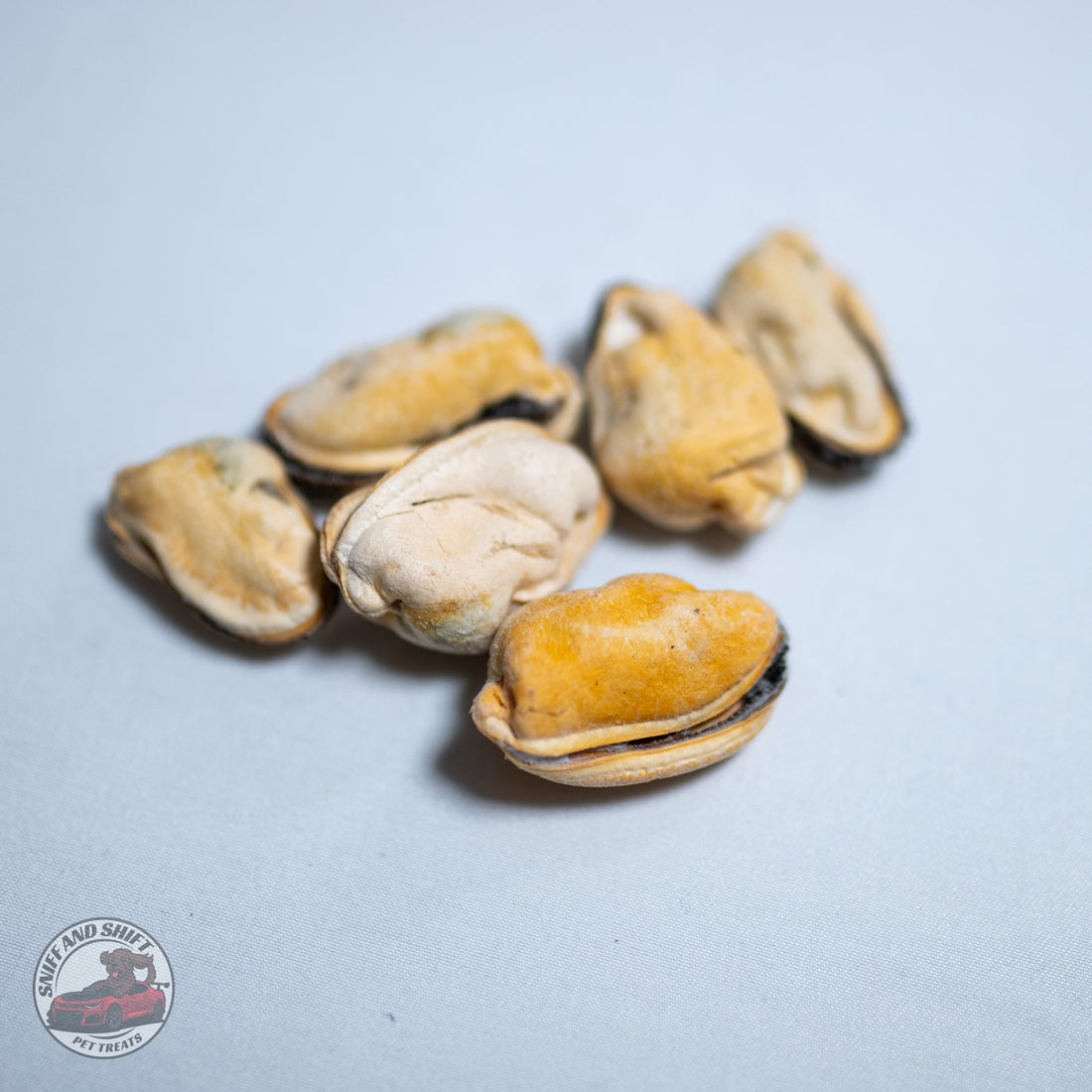 A trio of freeze-dried fish treats rich in omega-3 for dogs