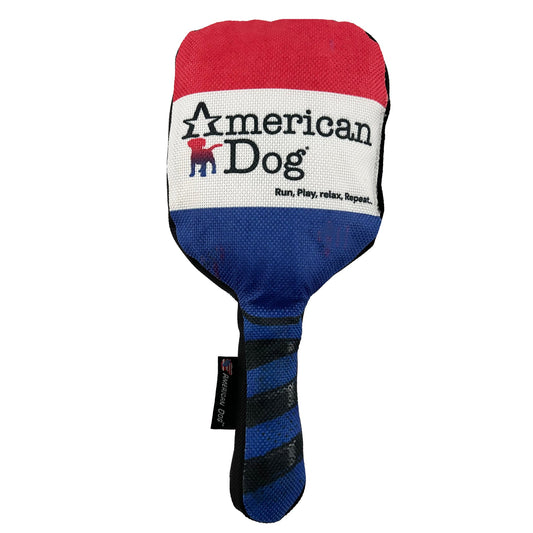 Pickle Ball Paddle dog toy by American Dog in red, white and blue ballistic fabric