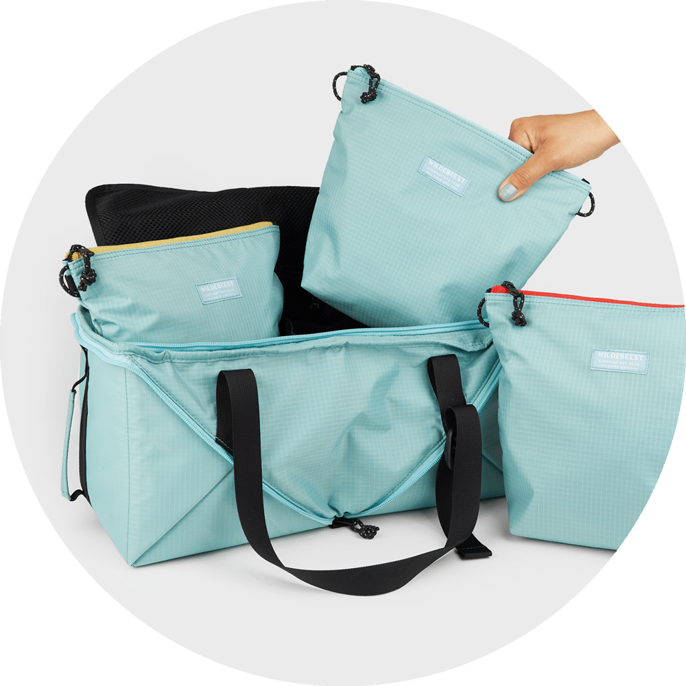 Bernal Transformer Travel Bag shown as cube and duffle, in Sky Blue and Black, Wildebeest, sold through Sniff and Shift