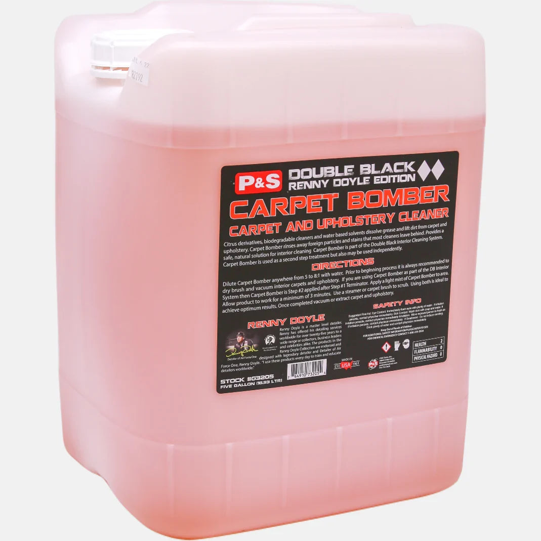 P&S Carpet Bomber five gallon translucent pail of pink liquid with a Double Black Carpet and Upholstery Cleaner label