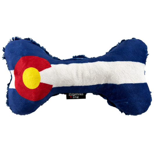 Colorado Flag Bone dog toy by American Dog, minky fleece bone with the red C flag and a blue swirly fleece back