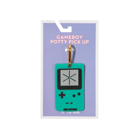 Gameboy Potty Pick Up, a rubber console-shaped bag charm, Pink Papyrus Co., sold through Sniff and Shift