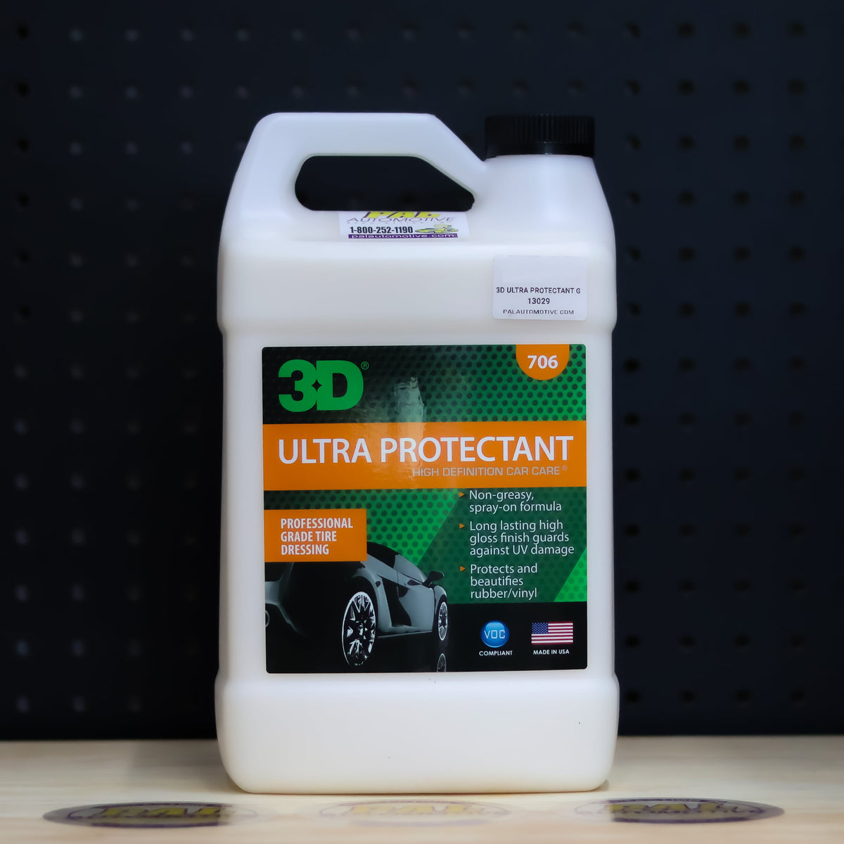 3D Ultra Protectant 1 gallon jug, white plastic with an orange and black tire dressing label and a carry handle