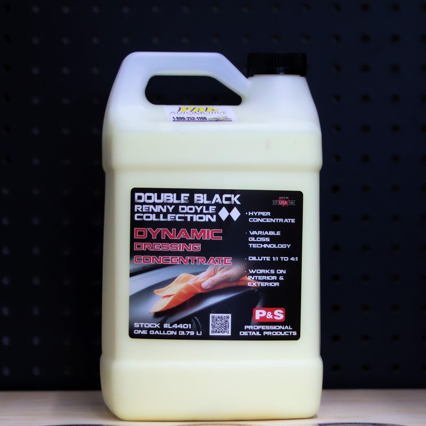 P&S Dynamic Dressing Concentrate gallon jug with cream liquid and a black Double Black label