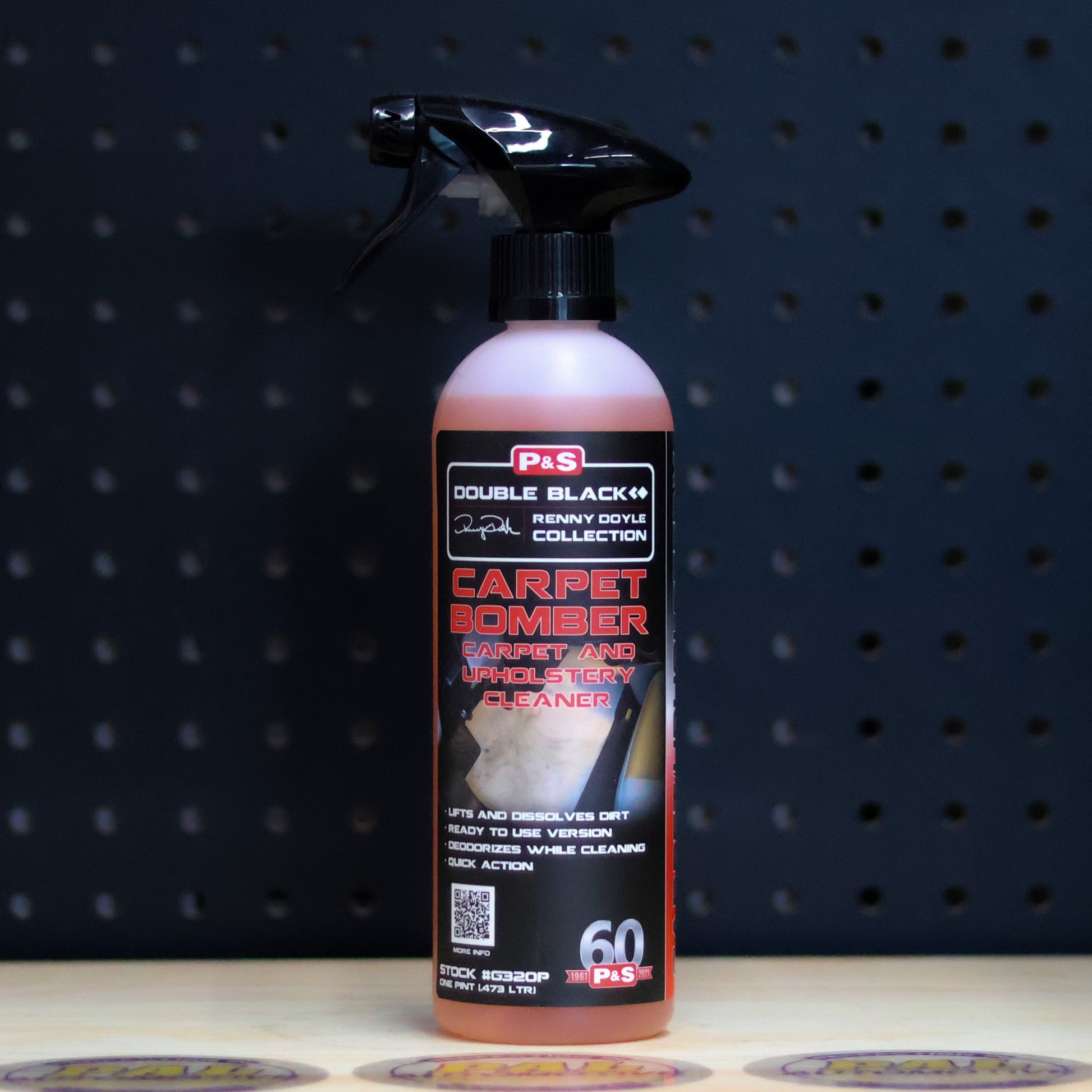 P&S Carpet Bomber pint spray bottle of orange liquid with a black trigger and a Double Black label