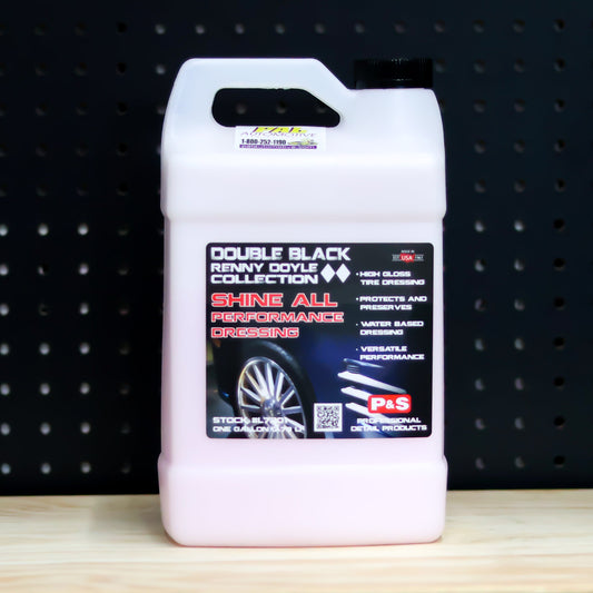 P&S Shine All Performance Dressing gallon jug of pale pink liquid with the black Double Black Renny Doyle Collection label showing a wheel