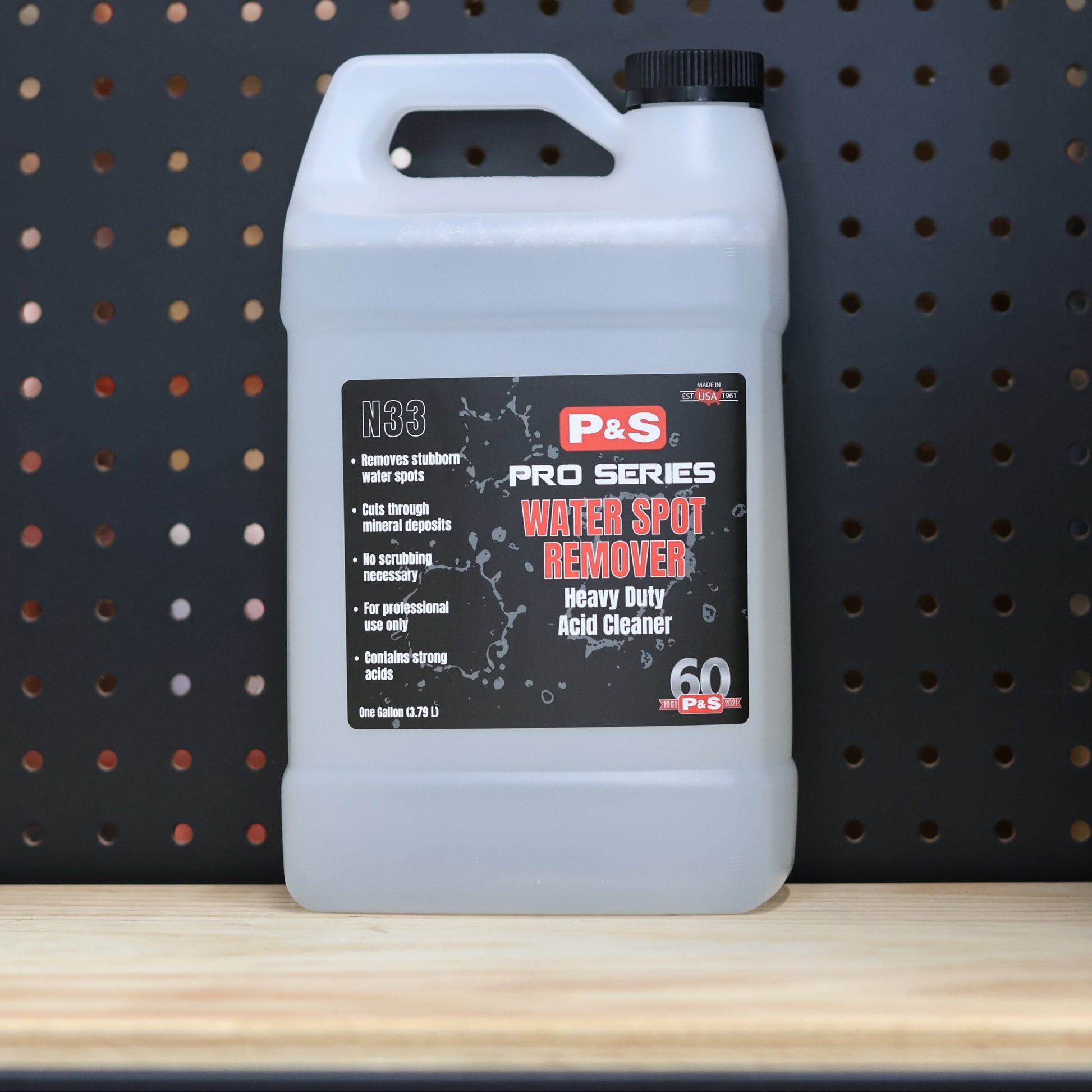 P&S Water Spot Remover gallon jug of clear liquid with the black Pro Series 1133 heavy duty acid cleaner label