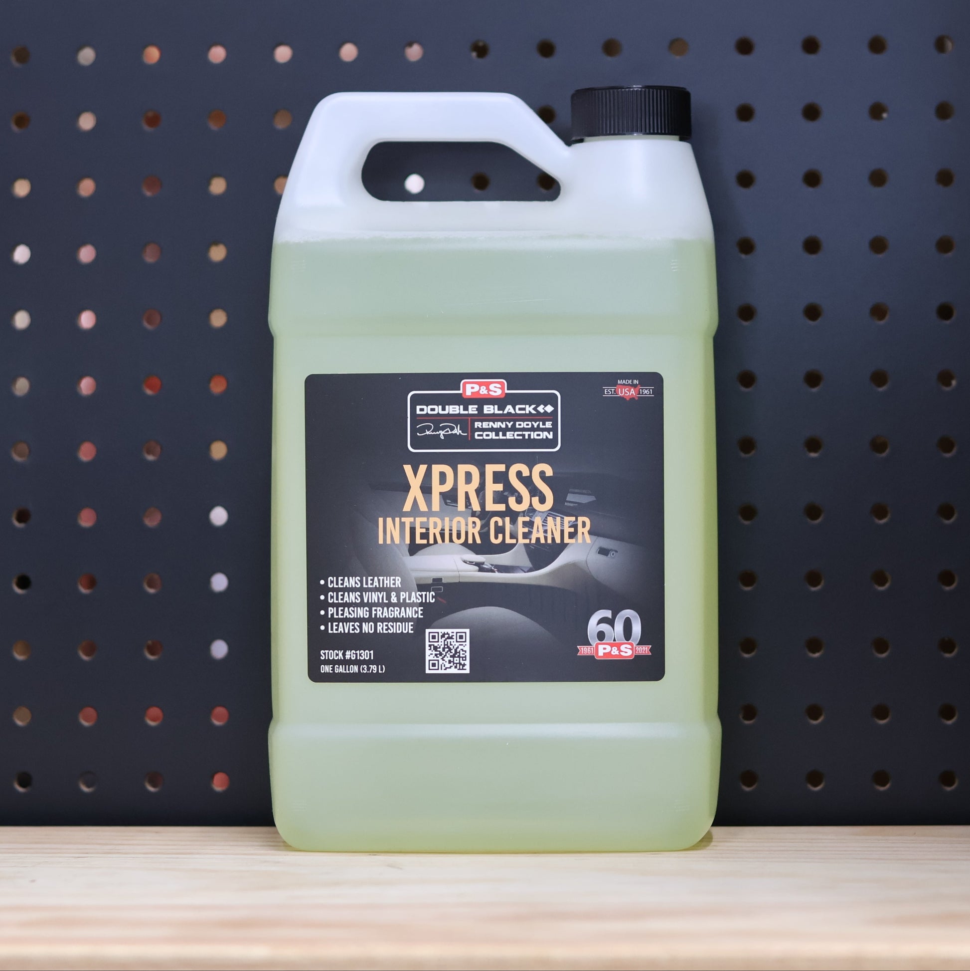 P&S Xpress Interior Cleaner one gallon jug of pale green liquid with a black Double Black label and carry handle