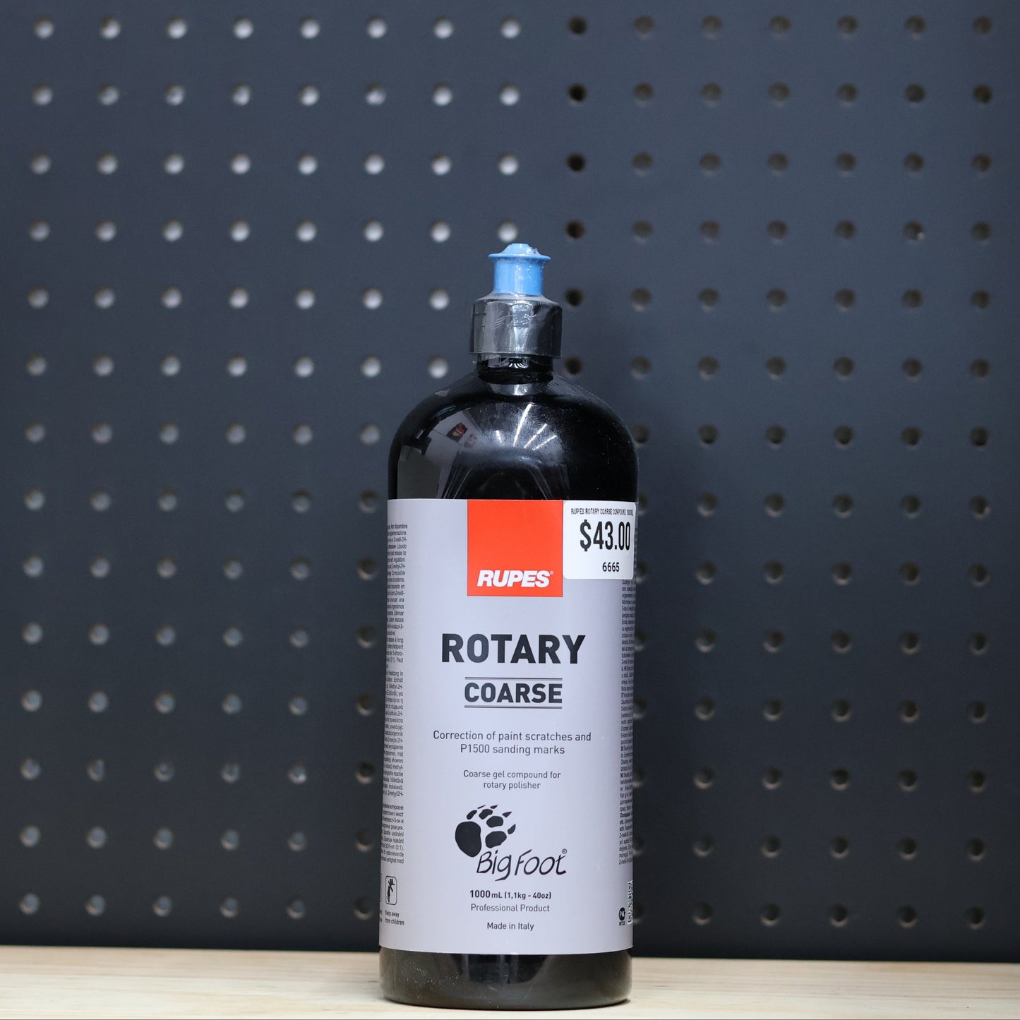 RUPES Rotary Coarse Compound in a 1000 ml black bottle with a blue cap and a BigFoot label