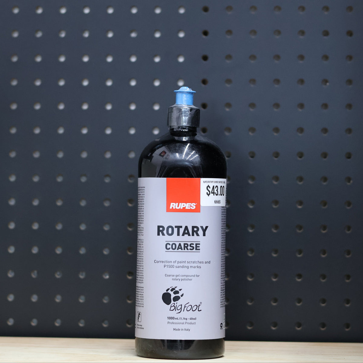 RUPES Rotary Coarse Compound in a 1000 ml black bottle with a blue cap and a BigFoot label