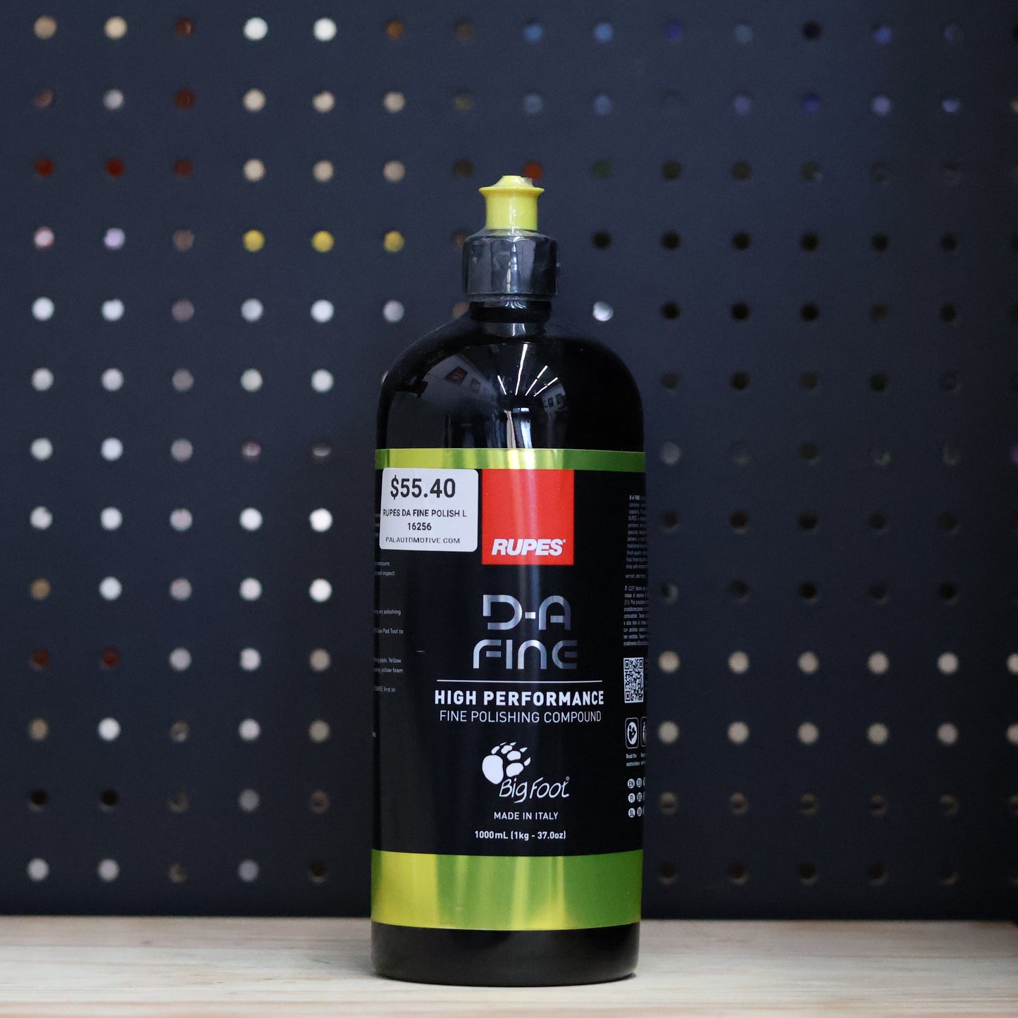 RUPES D-A Fine polishing compound 1000 ml black bottle with a yellow cap and a yellow label band