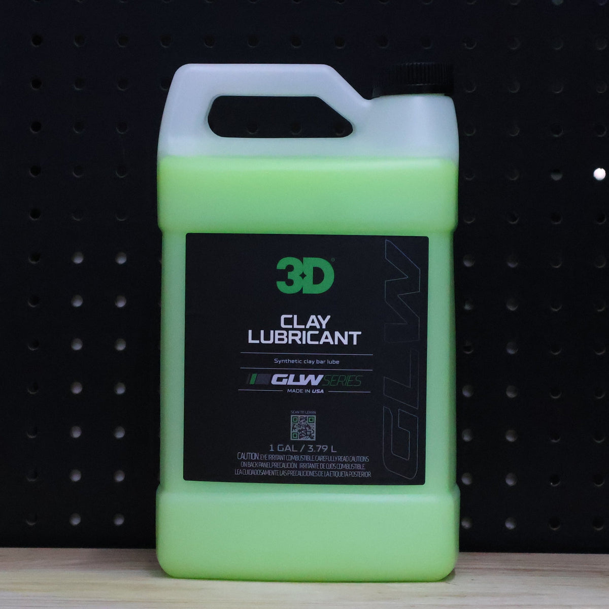 3D GLW Clay Lubricant gallon jug of pale green liquid with handle and black label