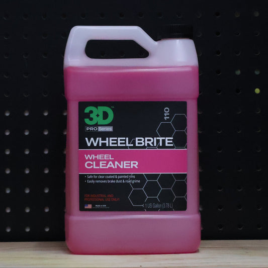 3D Wheel Brite wheel cleaner in a one gallon jug of pink liquid with a white handle