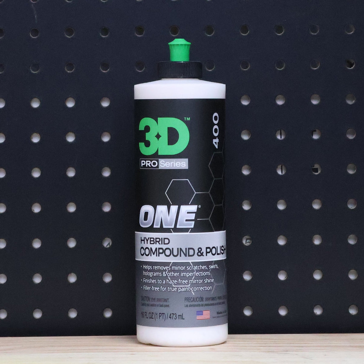 3D ONE hybrid compound and polish 16 oz bottle, white and black label with green ONE lettering and a green cap
