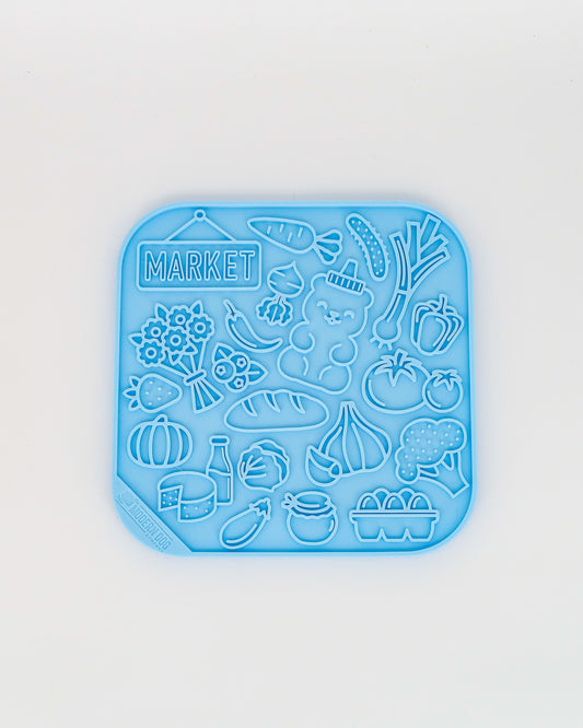 Farmer's Market silicone lick mat with suction cups by The Modern Dog Company, sold through Sniff and Shift