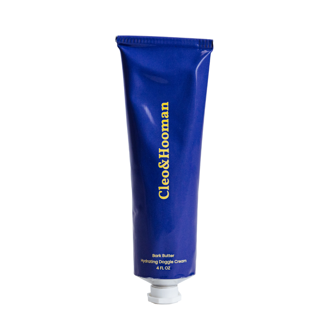 Cleo&Hooman Bark Butter hydrating doggie cream in a 4 fl oz navy blue squeeze tube with gold lettering