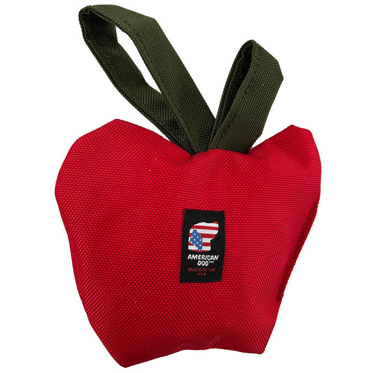 Apple Tug dog toy by American Dog, red ballistic nylon apple with green loop handles