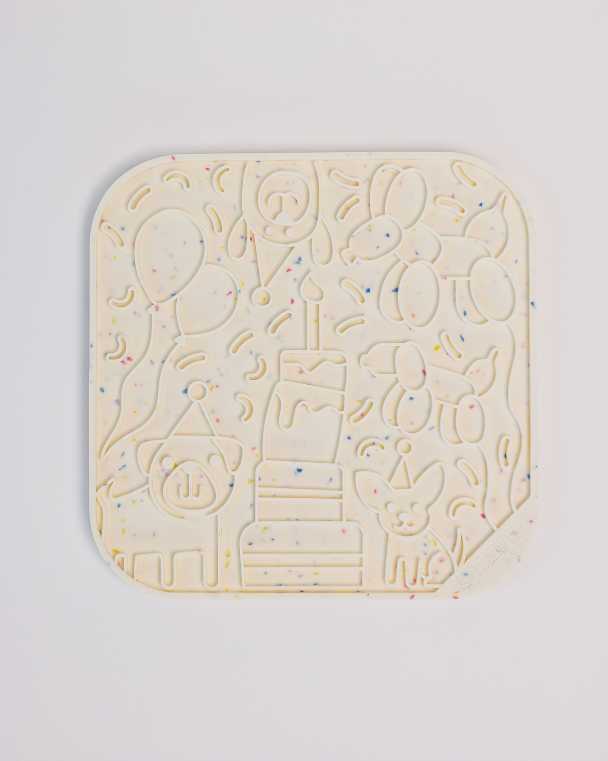 It's a Birthday Pawty silicone lick mat with suction cups by The Modern Dog Company, sold through Sniff and Shift