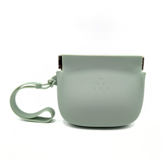 Up Dog Shop One-Hand Treat Training Pouch in green silicone with a wrist strap and a metal squeeze frame