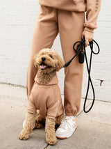 Adult wearing Sandstone Fleece Joggers from the fleece jogger line, Good Thomas, sold through Sniff and Shift