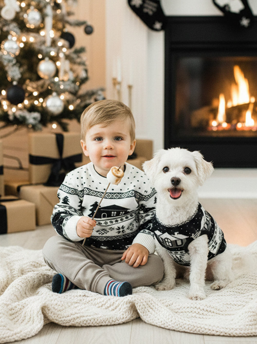 Dog and kid matching in the Cabin Sweater alpine pattern knit, Good Thomas, sold through Sniff and Shift