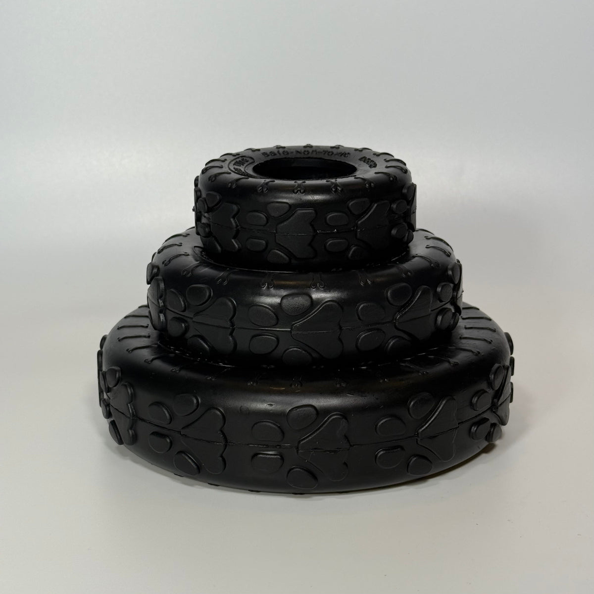 Tire and Treats bundle: Sniff and Shift rubber dog tire toy with a bag of freeze-dried cheddar cheese bites
