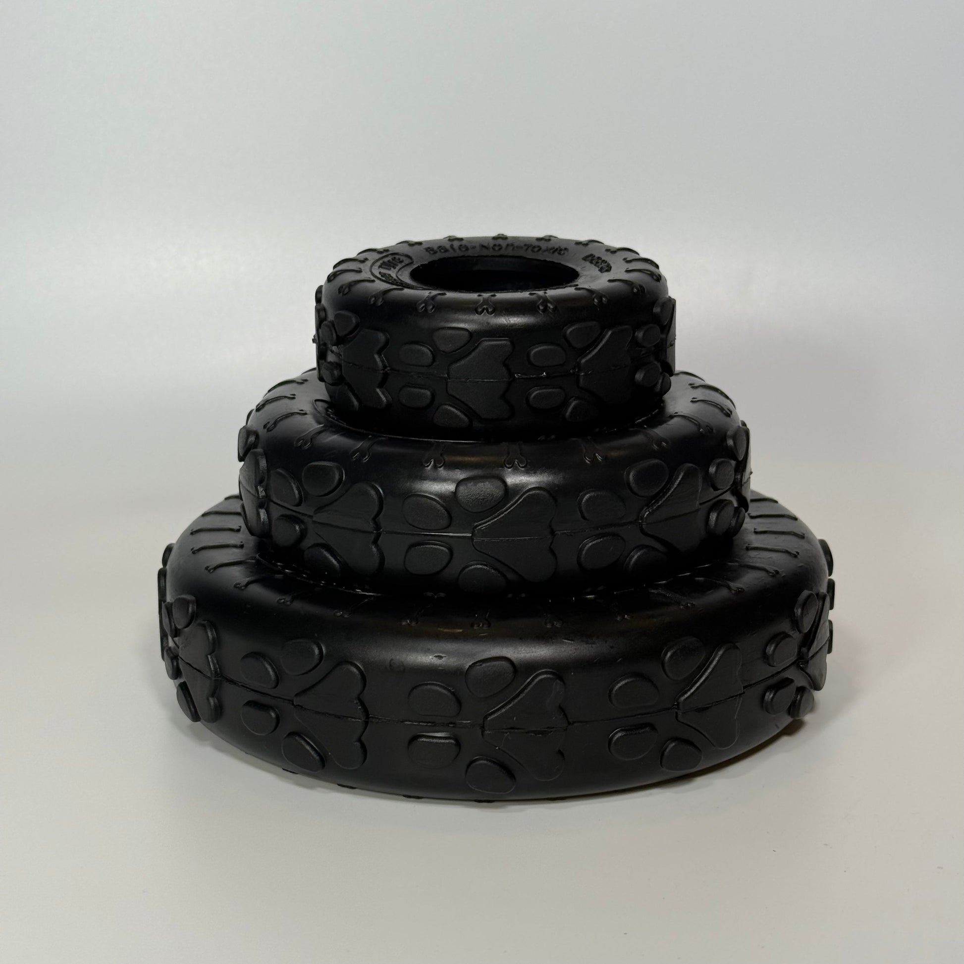 Tire and Treats bundle: Sniff and Shift rubber dog tire toy with a bag of freeze-dried cheddar cheese bites